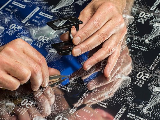 Putting the finishing touches to the printing plate